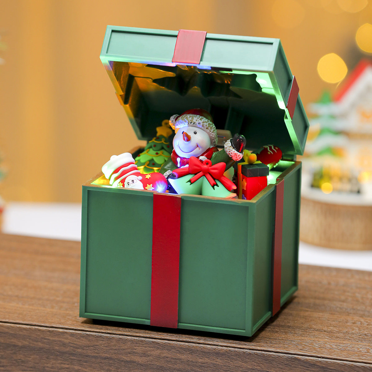 Multiple Christmas rotating resin light-up music box ornaments, rotating train decorations, Christmas gifts.