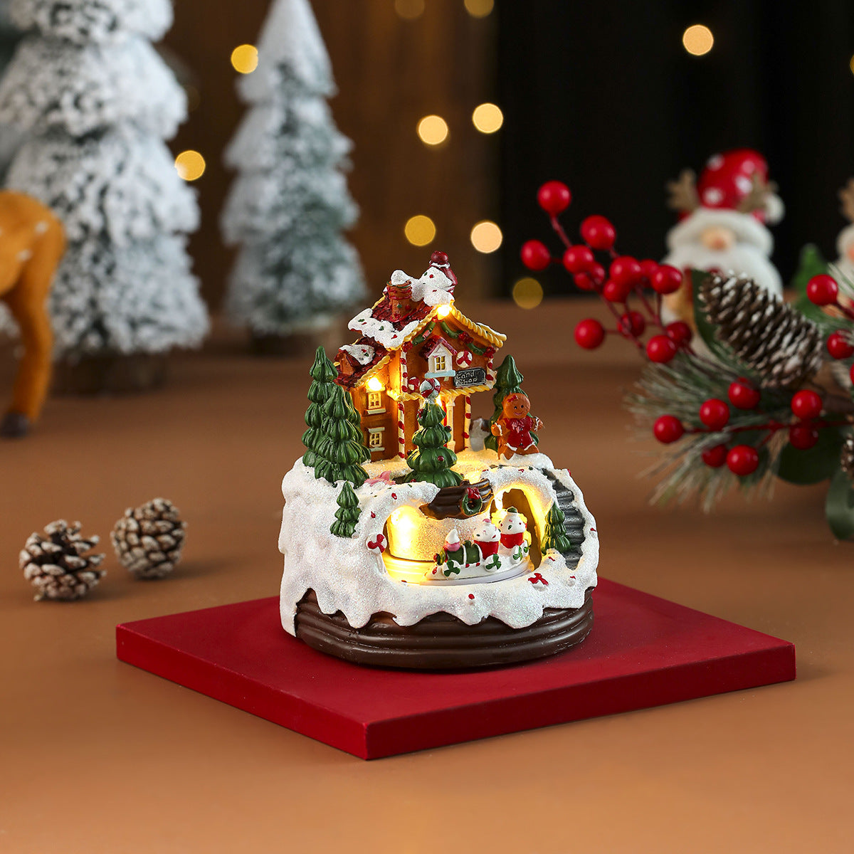 Multiple Christmas rotating resin light-up music box ornaments, rotating train decorations, Christmas gifts.