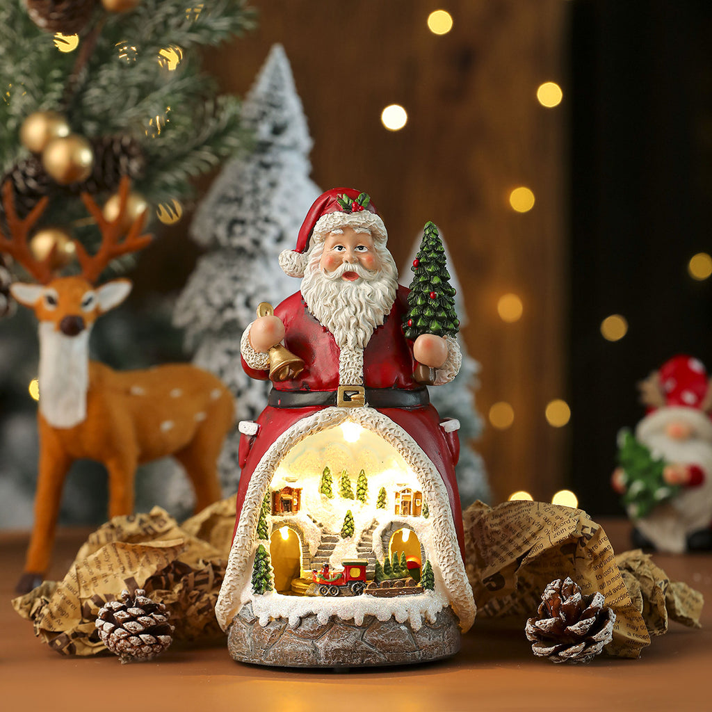 Multiple Christmas rotating resin light-up music box ornaments, rotating train decorations, Christmas gifts.