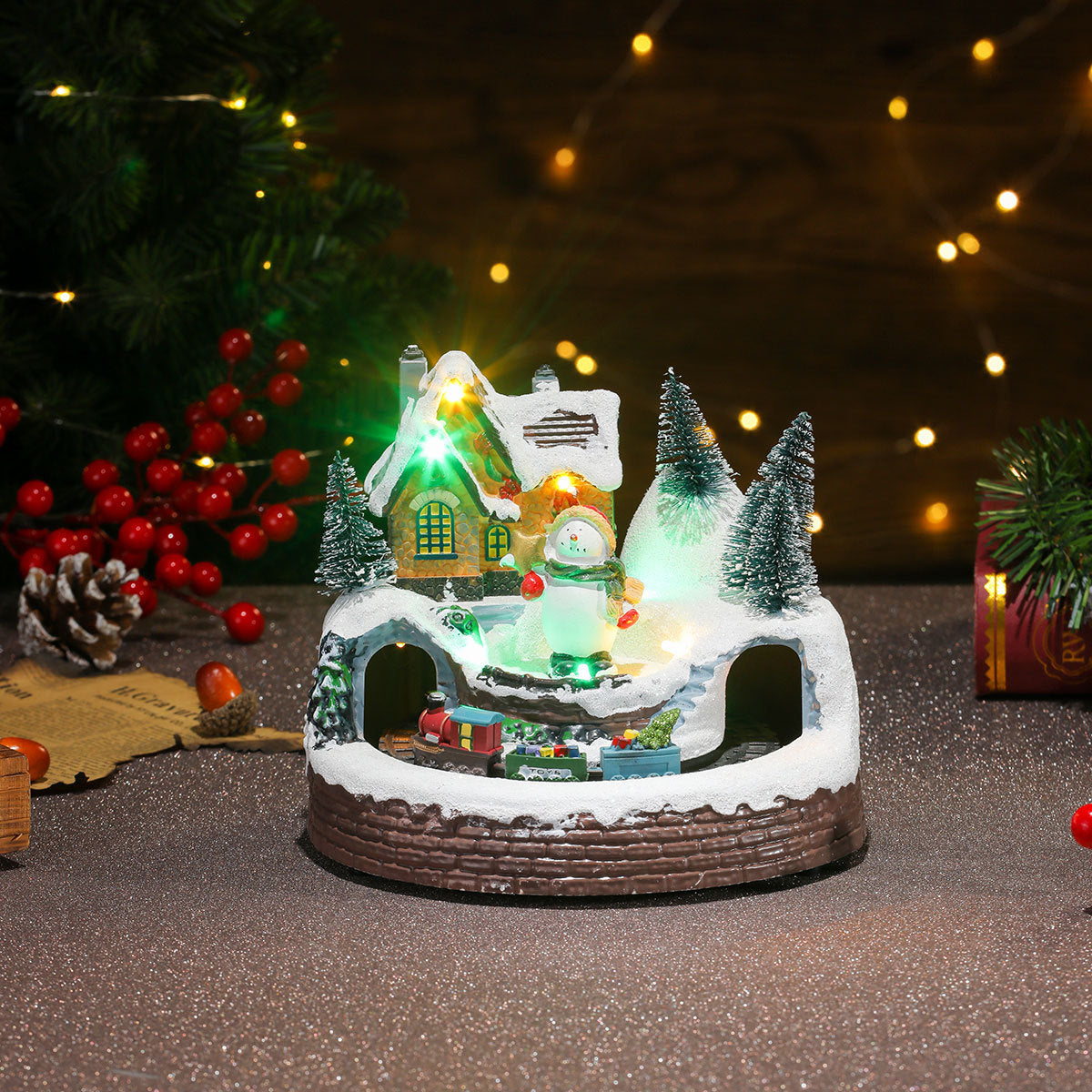 Multiple Christmas rotating resin light-up music box ornaments, rotating train decorations, Christmas gifts.