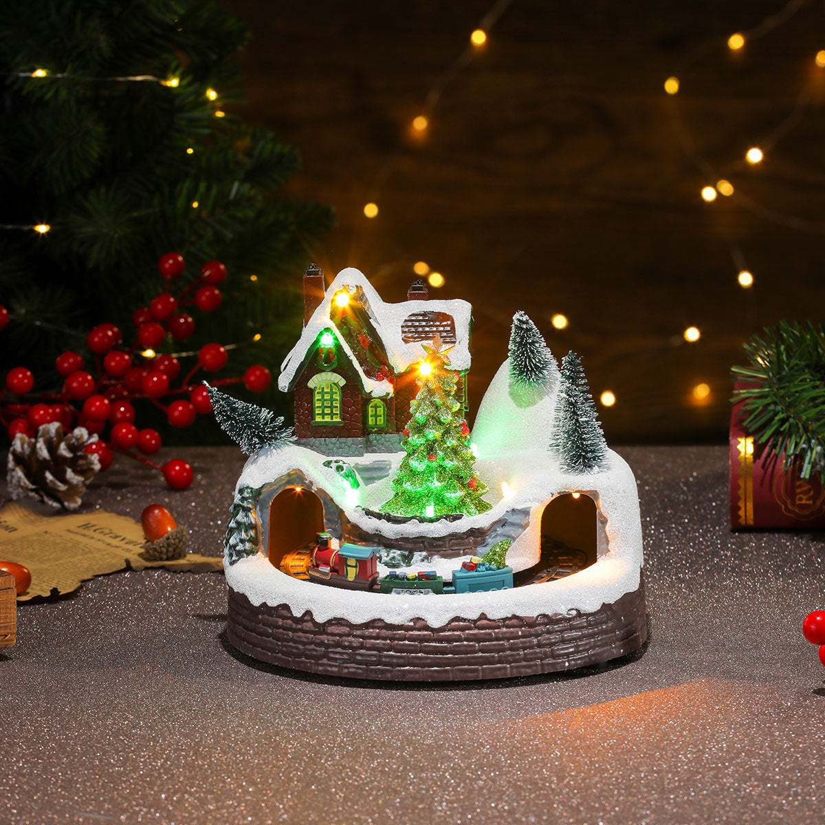 Multiple Christmas rotating resin light-up music box ornaments, rotating train decorations, Christmas gifts.