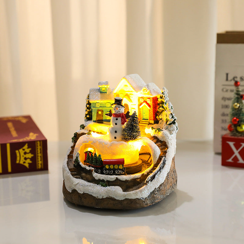 Multiple Christmas rotating resin light-up music box ornaments, rotating train decorations, Christmas gifts.