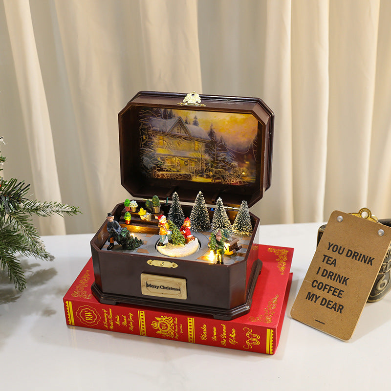 Multiple Christmas rotating resin light-up music box ornaments, rotating train decorations, Christmas gifts.