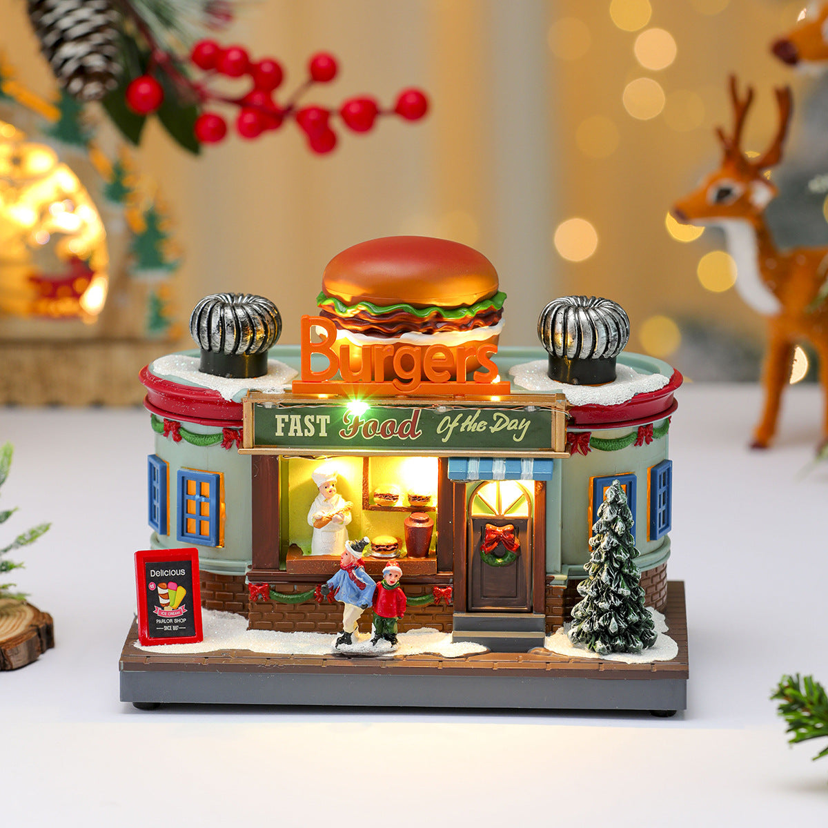 Multiple Christmas rotating resin light-up music box ornaments, rotating train decorations, Christmas gifts.