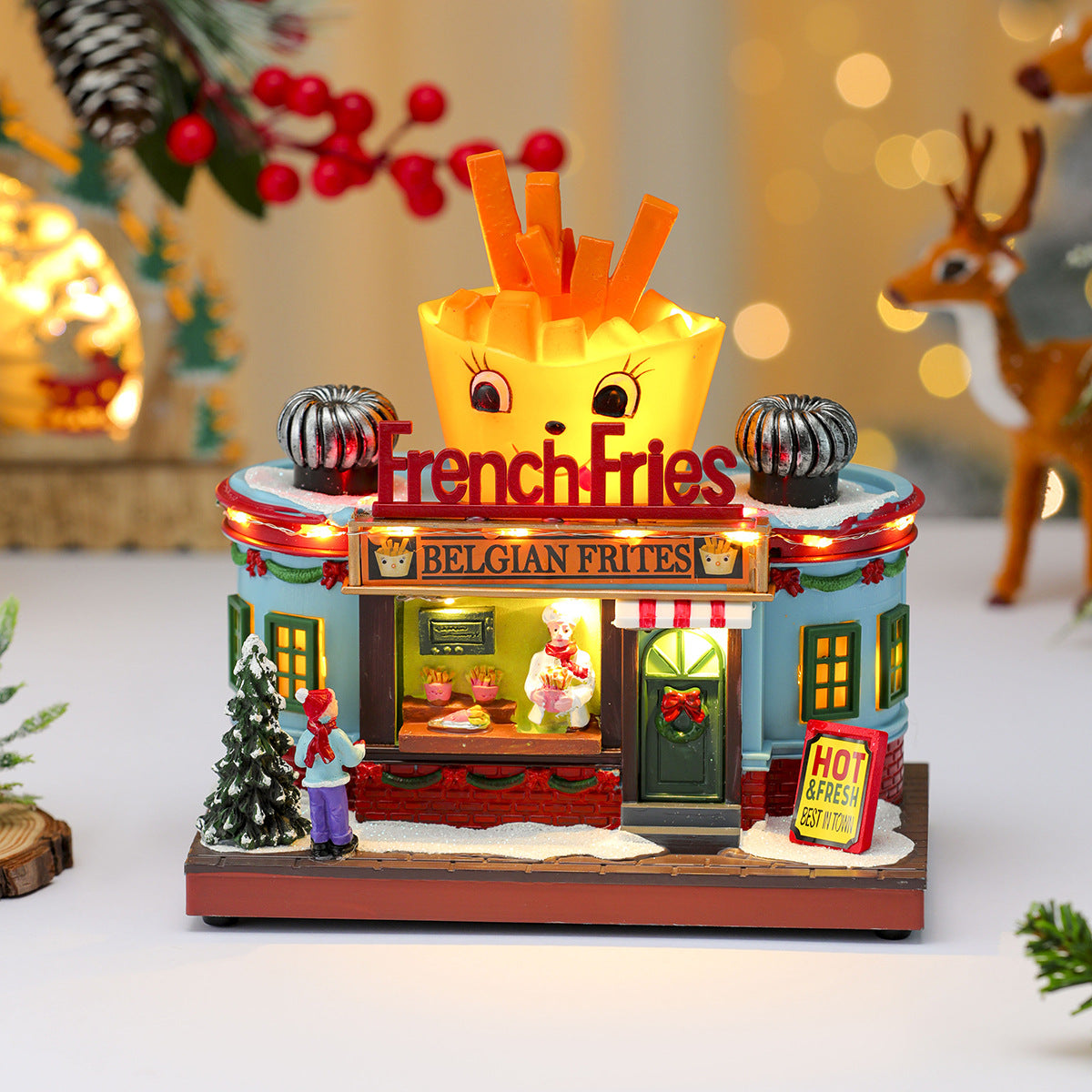 Multiple Christmas rotating resin light-up music box ornaments, rotating train decorations, Christmas gifts.