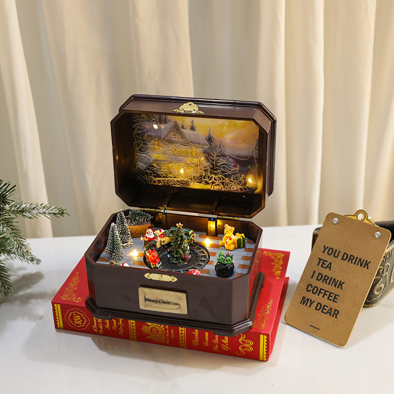 Multiple Christmas rotating resin light-up music box ornaments, rotating train decorations, Christmas gifts.