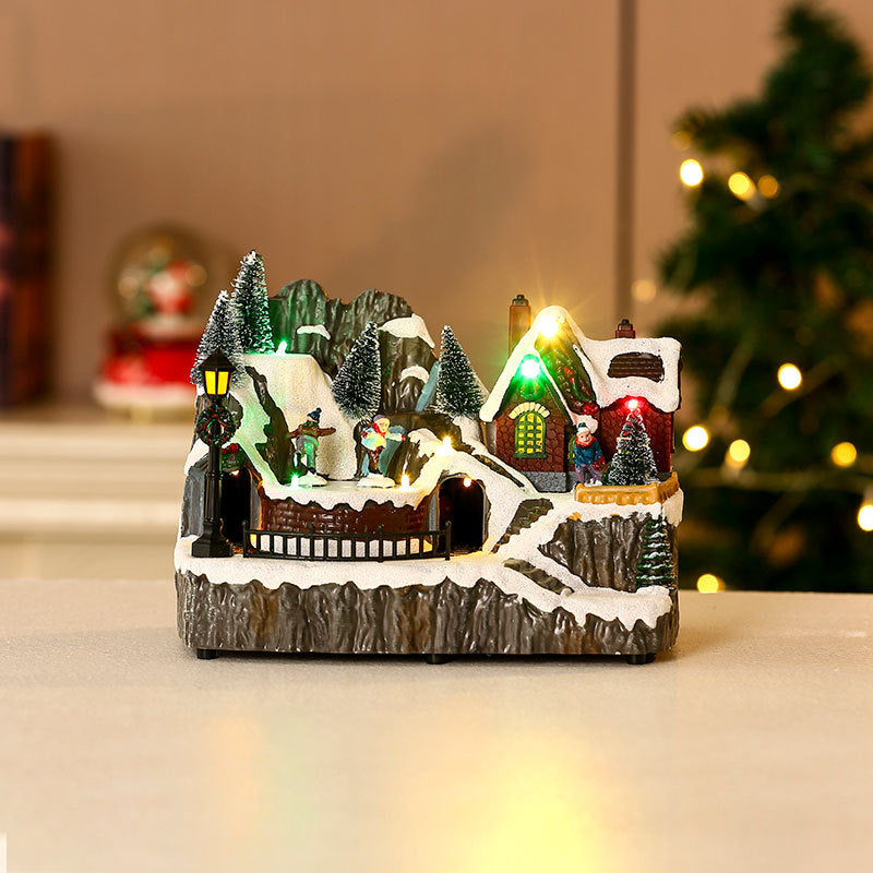 Multiple Christmas rotating resin light-up music box ornaments, rotating train decorations, Christmas gifts.