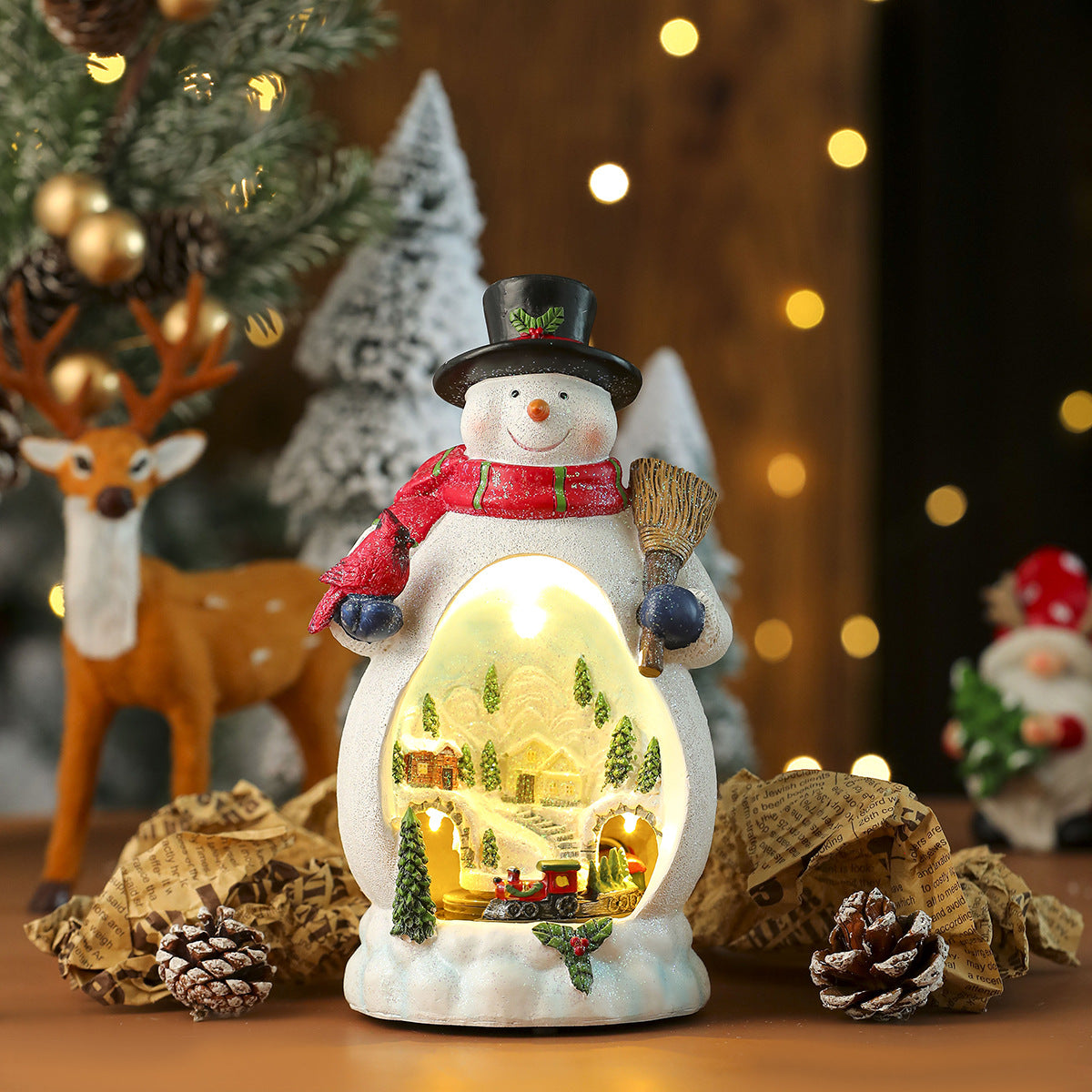 Multiple Christmas rotating resin light-up music box ornaments, rotating train decorations, Christmas gifts.